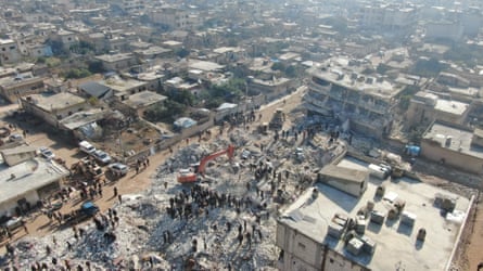 An aerial view of search-and-rescue efforts among collapsed buildings in Jindires, Syria.