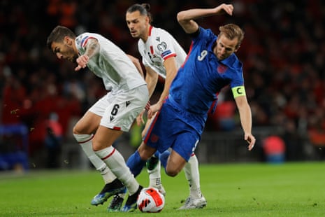 England’s Harry Kane is fouled by Kastriot Dermaku (left) as Frederic Veseli looks on.