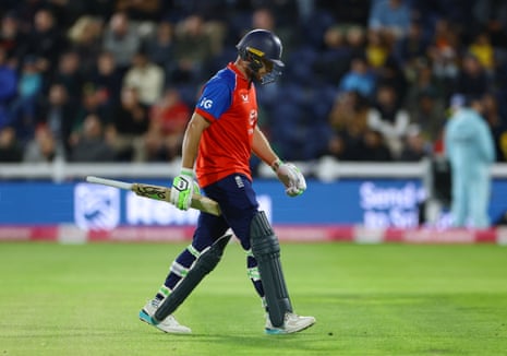 Jos Buttler walks after losing his wicket