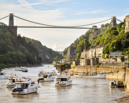 Boats make their way through the Avon Gorge and underneath Clifton Suspension Bridge as they head to Bristol harbour for the Bristol Harbour Festival
