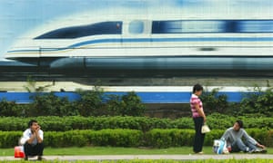 A vision of high-speed growth … a billboard features a magnetic levitation train in Shanghai.