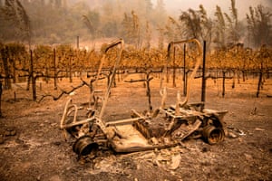Napa Valley, USThe remains of a golf cart burned by the Glass Fire sits next to a vineyard at Calistoga Ranch in Calistoga, California. -Two California wildfires that ravaged Napa’s famous wine region have killed three people and exploded in size as firefighters faced a battle to contain the blazes