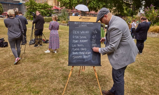 Sam Rosbottom, from Betfair, updates current odds on the Tory leadership race on College Green, Westminster.