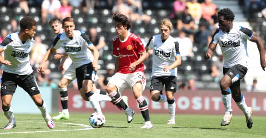 Derby try to halt Facundo Pellistri during a pre-season friendly in July.
