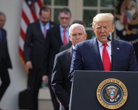 U.S. President Trump declares coronavirus pandemic a national emergency during news conference at the White House in Washington<br>U.S. President Donald Trump arrives with Vice President Mike Pence and otther officials to declare the coronavirus pandemic a national emergency during a news conference in the Rose Garden of the White House in Washington, U.S., March 13, 2020. REUTERS/Jonathan Ernst