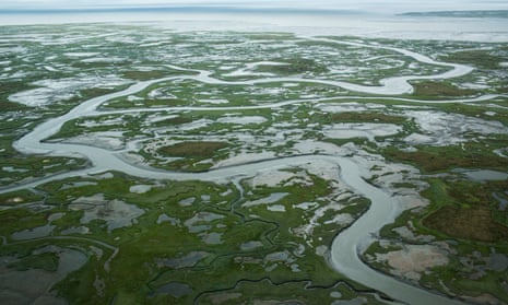 The marshy, tundra landscape surrounding Newtok, Alaska, a village threatened by the melting of permafrost.  