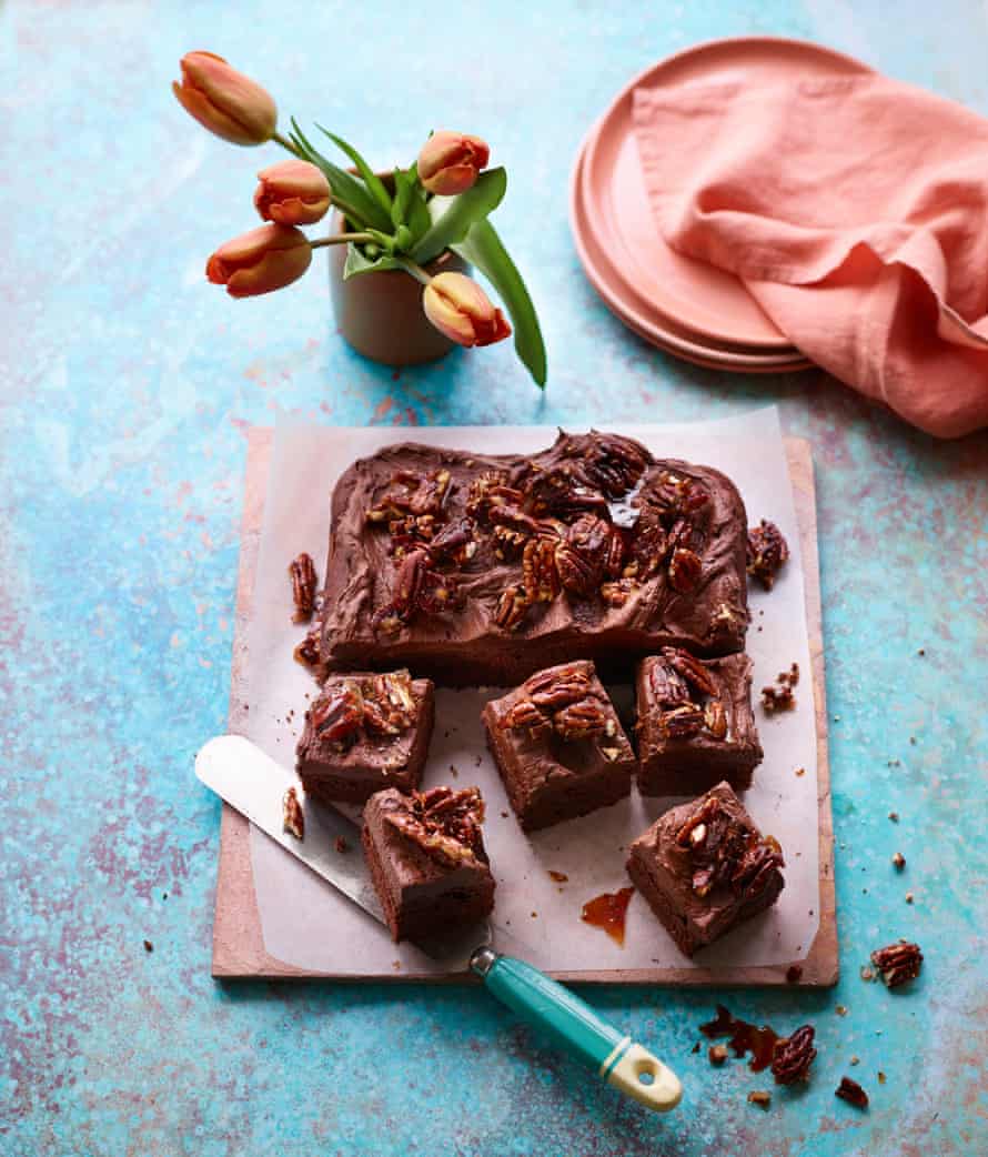 Banana cocoa cake with whipped ganache and pecan brittle
