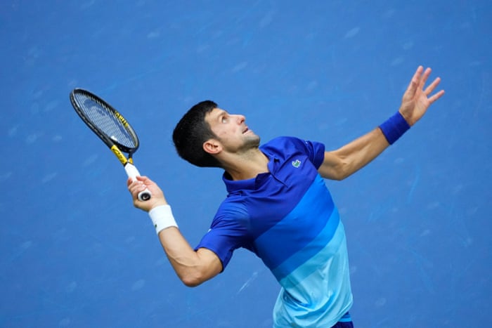Novak Djokovic unleashes a serve.