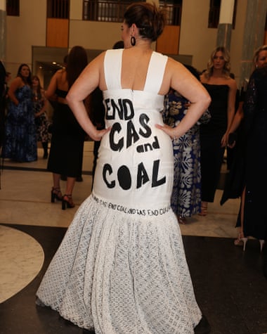 The back of Sarah Hanson-Young’s white dress showing the slogan ‘end gas and coal’