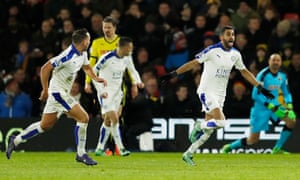 Riyad Mahrez celebrates after scoring the first goal for Leicester.
