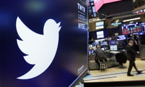 Twitter logo above a trading post on the floor of the New York Stock Exchange.