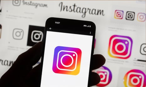 The Instagram logo seen on a phone screen