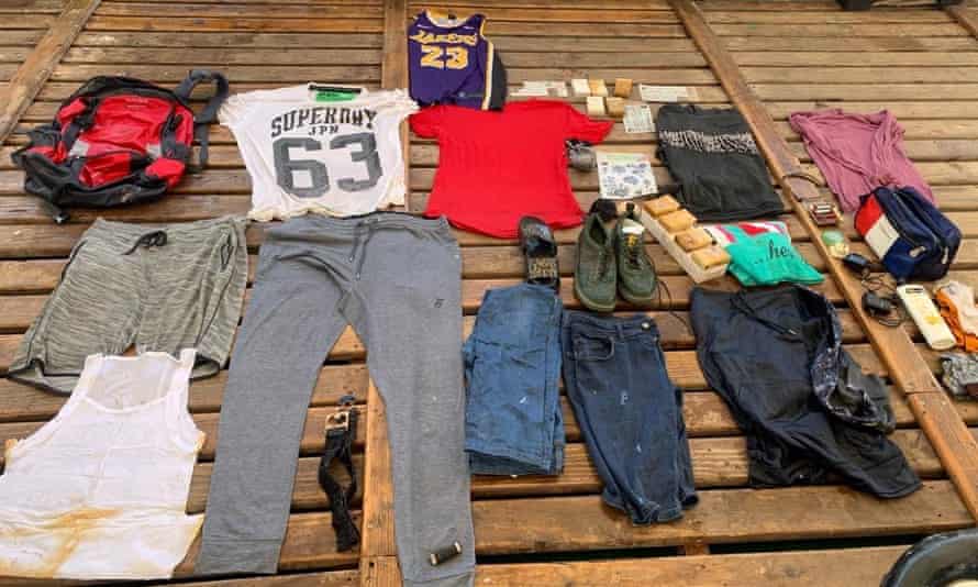 The contents of a rucksack belonging to Algerian couple Ahmed and Doudou, which was found in the Mediterranean by the NGO Open Arms in Italy.