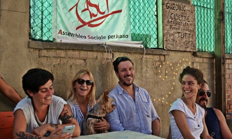 Members of the grassroots movement Assemblea Sociale per la Casa, including its co-founder, Nicola Ussardi (centre).
