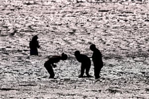 People paddling in the sea
