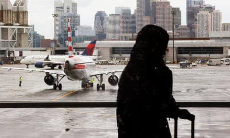 Passengers travel through Logan airport in Boston on 22 November. 