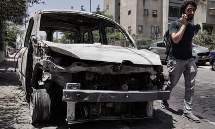 A torched vehicle in the city of Lod, Israel.
