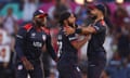 Harmeet Singh (centre) celebrates after taking the first wicket of the T20 World Cup