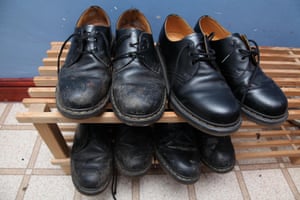 Four pairs of black Fr Marten shoes