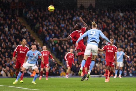 Erling Haaland of Manchester City scores his team’s first goal.
