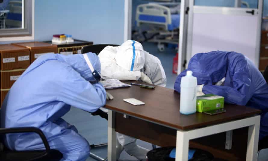 Medical workers take a break at a hospital in Cairo, Egypt, July, 2020.