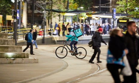 A Deliveroo courier in Manchester.