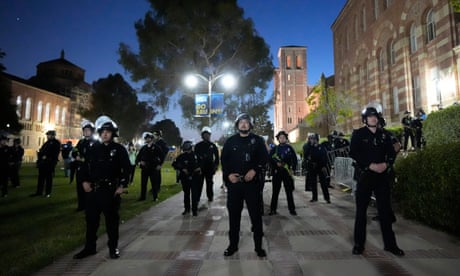 Campus protests: UCLA students in standoff with police as demonstrations spread across US
