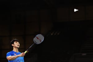 The badminton player Kean Yew Loh, of Singapore, keeps his eye on the shuttlecock.