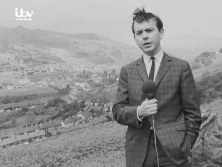 A screenshot from a black and white ITV report by John Humphrys on the scene at Aberfan, Wales in October 1966.