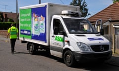 Asda supermarket food shopping van driver making a delivery