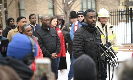 The Minneapolis city councilman Abdi Warsame addresses the media outside the building.