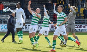 Celtic players celebrate at the Kilmac Stadium after finally breaking down Dundee