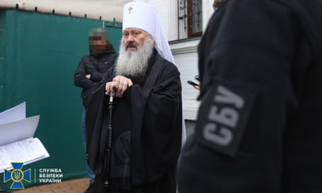 Metropolitan Pavel, the abbot of the Kyiv-Pechersk Lavra monastery, and Ukrainian security service officers in Kyiv