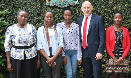 John Healey and four women stand in line for a photo