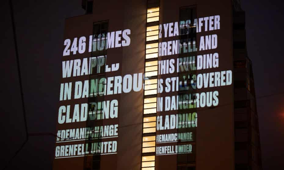 A message warning of dangerous cladding projected on to the NV buildings in Salford