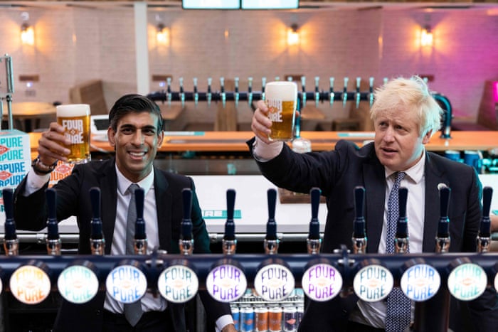 And Johnson and Sunak posing with drinks - even though Sunak does not drink, and Johnson is supposed to be on the wagon until his next baby is born, as a gesture of solidarity with his wife.