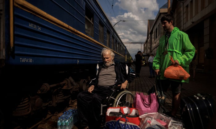Russia’s attack on Ukraine continues in PokrovskA man on a wheelchair waits to board a train to Dnipro and Lviv during an evacuation effort from war-affected areas of eastern Ukraine, in Pokrovsk, Ukraine, August 4, 2022. REUTERS/Alkis Konstantinidis TPX IMAGES OF THE DAY