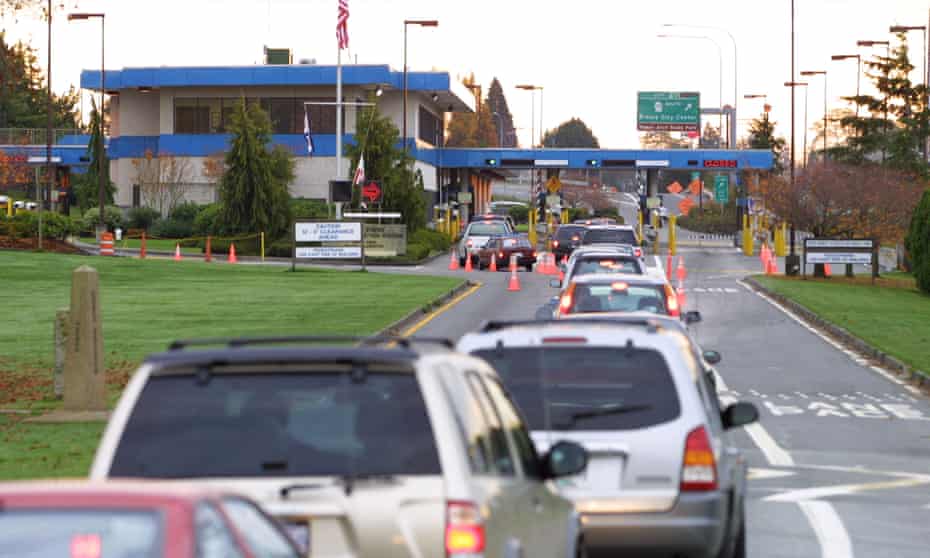 Vehicles line up to enter the US at the border crossing between Blaine, Washington, and White Rock, British Columbia, but along the beach where Cedella Roman was arrested the border is unmarked.