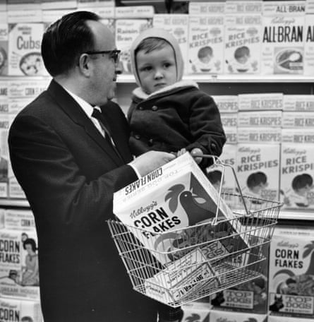 A man and child buying cornflakes in the 1970s