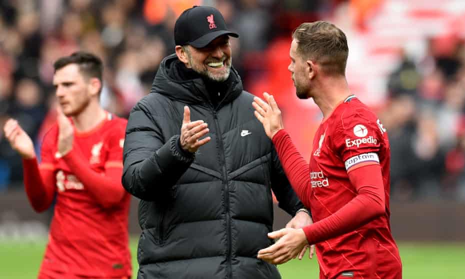 Jürgen Klopp congratulates Jordan Henderson after the final whistle.
