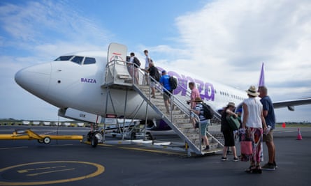 Passengers boarding a Bonza plane dubbed ‘Bazza’
