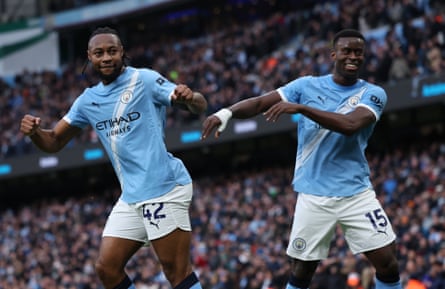 Manchester City’s new signings Antoine Semenyo (left) and Marc Guehi celebrate after Semenyo scored the second goal in City’s victory over Wolves.