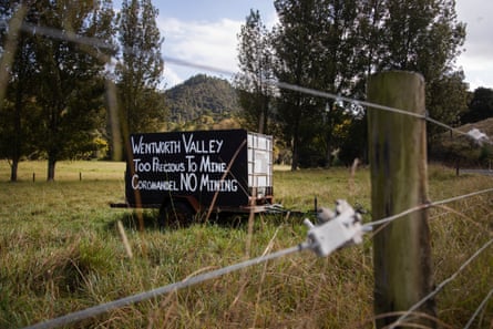 A sign in a farmers paddock pictured on the Coromandel Peninsula, New Zealand. A growing section of the population is opposed to expanding gold mining operations in the region.