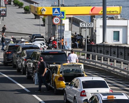 Motorists form a queue as they wait to refuel their cars at a Rosneft gas station in Moscow on July 3, 2026.