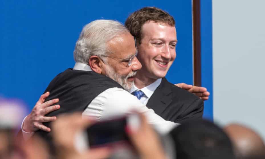 Indian prime minister Narendra Modi embraces Facebook CEO Mark Zuckerberg at a meeting in California.