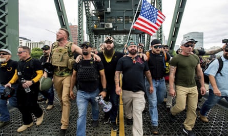 Members of the Proud Boys and other rightwing demonstrators march in Portland, Oregon in August, 2019