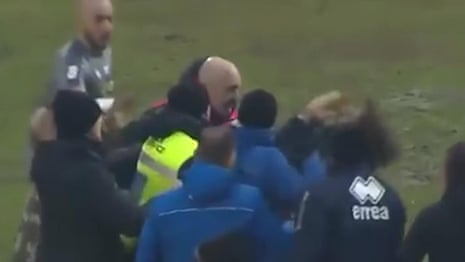 Italian football coach banned for butting rival at end of Serie C match – video