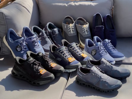 Group of slip-on shoes resting on outdoor couch