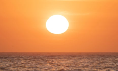 The sun rises at Bondi beach in Sydney, Australia
