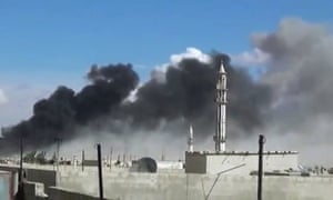 Smoke rising after airstrikes in Talbiseh